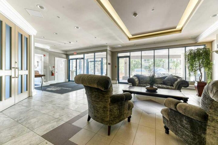 Property Photo:  4 14 Street NW 210  AB T2N 1Z4 