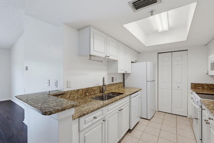 Property Photo:  400 Crestwood Court N 417  FL 33411 