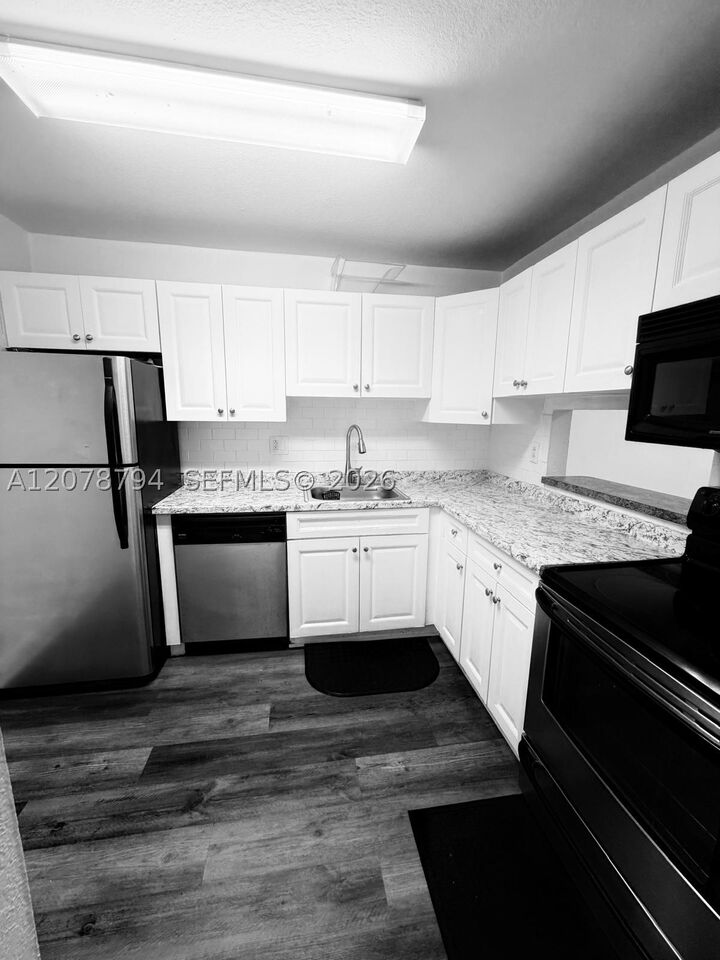 Property Photo: 5201 Geneva Way 311 FL 33166
