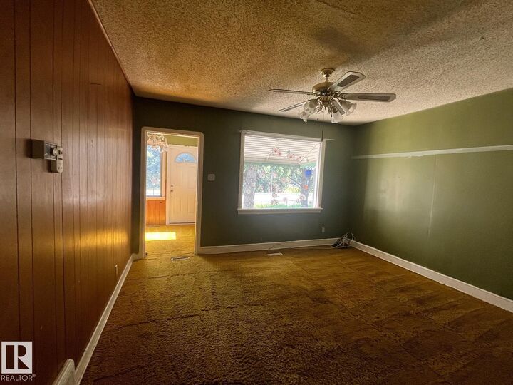 Property Photo:  11408 82 Street NW  AB T5B 2V4 