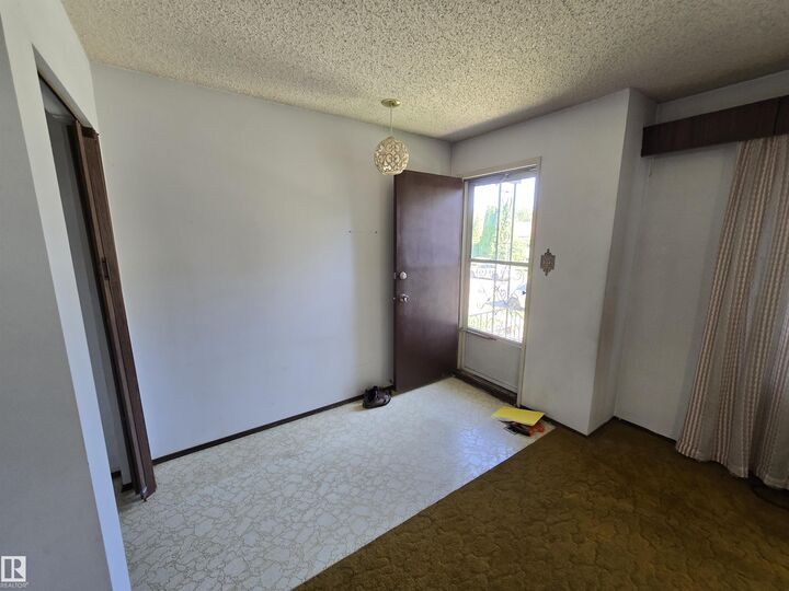 Property Photo:  12020 54 Street NW  AB T5W 3N3 
