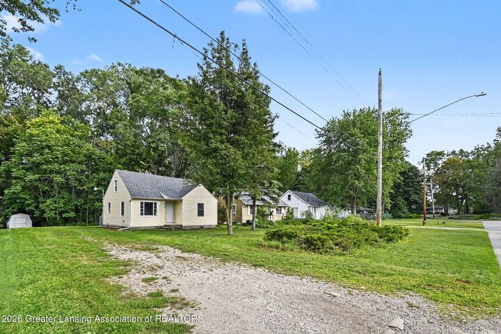 Property Photo:  6409 Coulson Court  MI 48911 