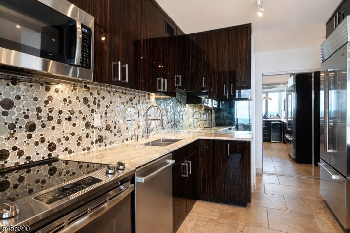 Property Photo: 1 Claridge Dr 1025 NJ 07044