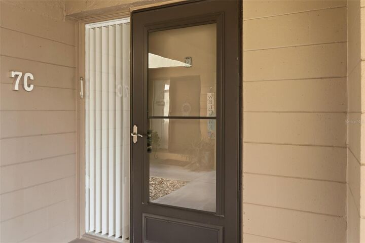 Property Photo:  130 Jasmine Woods Court 7C  FL 32725 