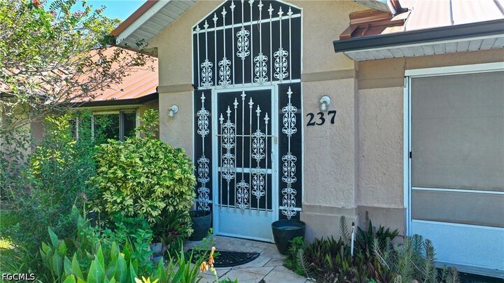 Property Photo: 237 Lauberge Court FL 33936