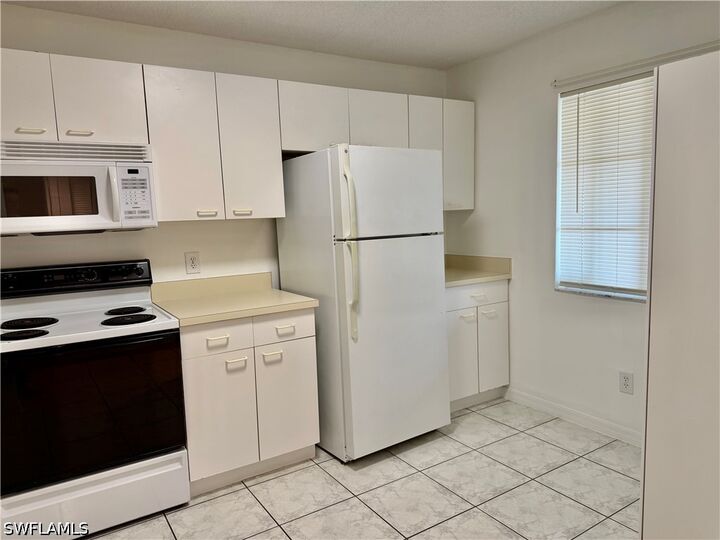 Property Photo:  7755 Jewel Lane 103  FL 34109 