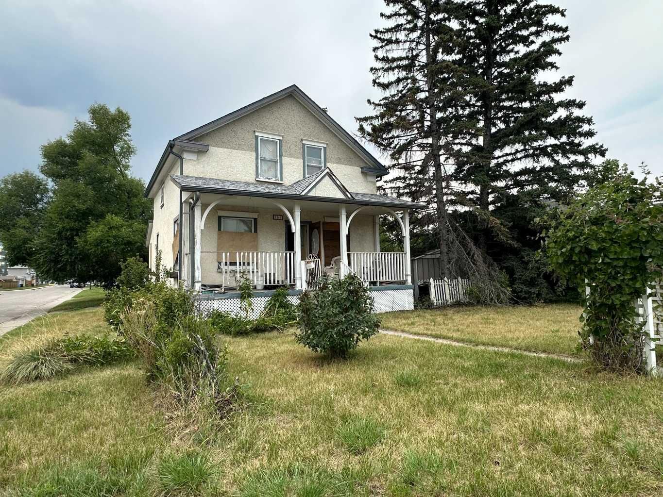 Property Photo:  7247 25 Street SE  AB T2C 0Z9 