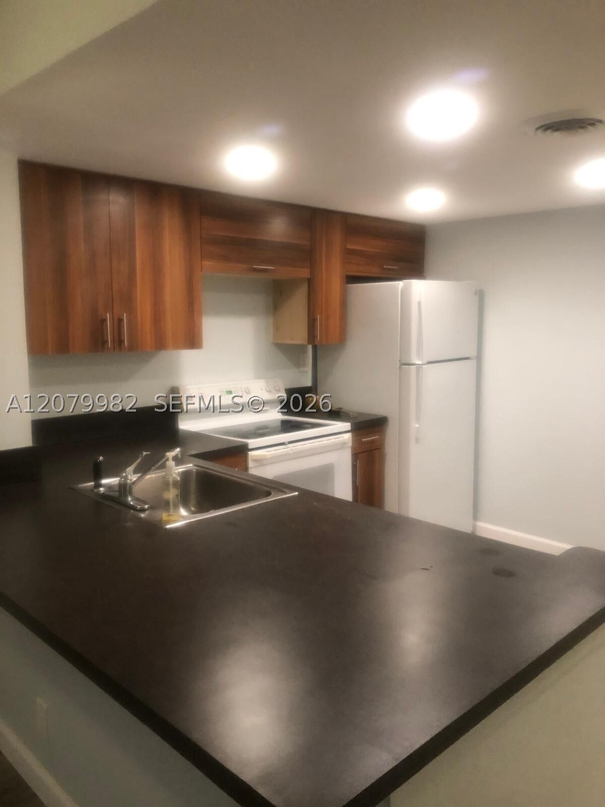 Property Photo:  3700 N Pine Island Rd 202  FL 33351 