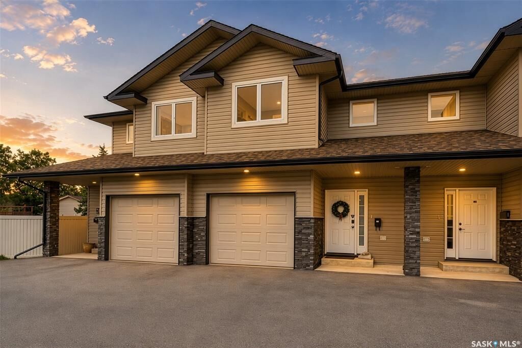 Property Photo:  33 Wood Lily Drive A2  SK S6J 1B4 