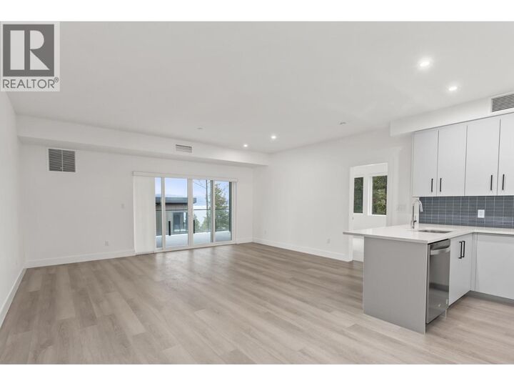 Property Photo: 3434 McKinley Beach Drive 209 BC V1V 0H3