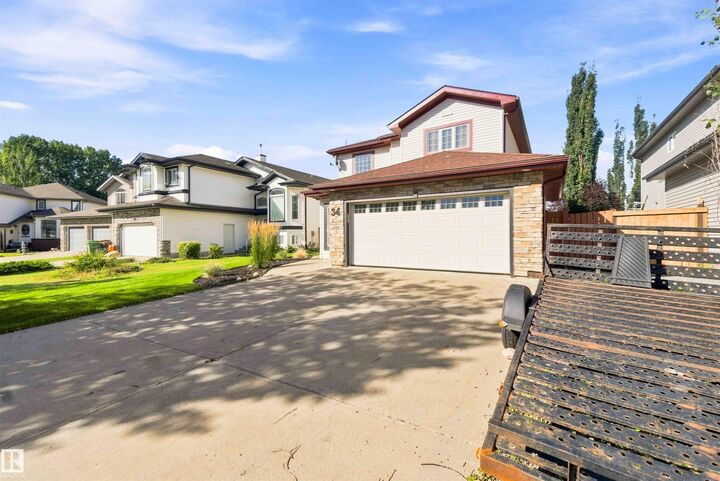 Property Photo:  34 Norris Crescent  AB T8N 7M4 