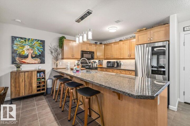 Property Photo:  400 Palisades Way 309  AB T8H 0H4 