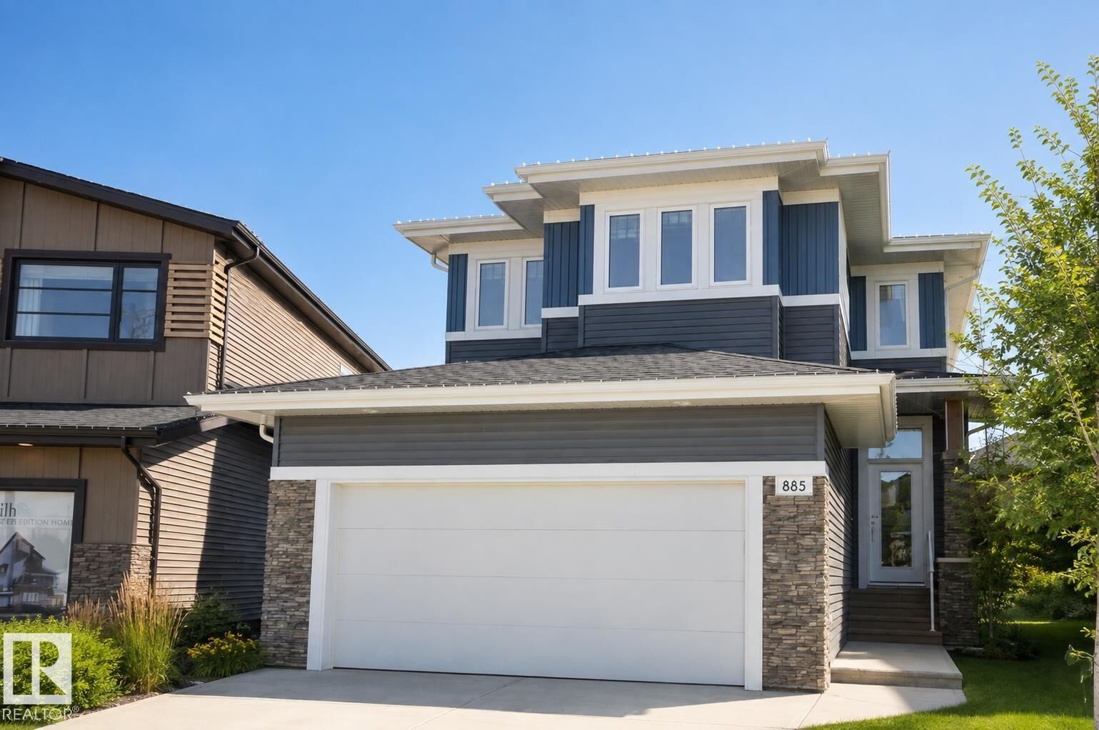 Property Photo: 885 Windermere Wynd NW AB T6W 2M6