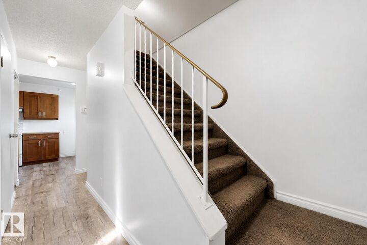 Property Photo:  303 Primrose Gardens Gardens NW  AB T5T 0R1 