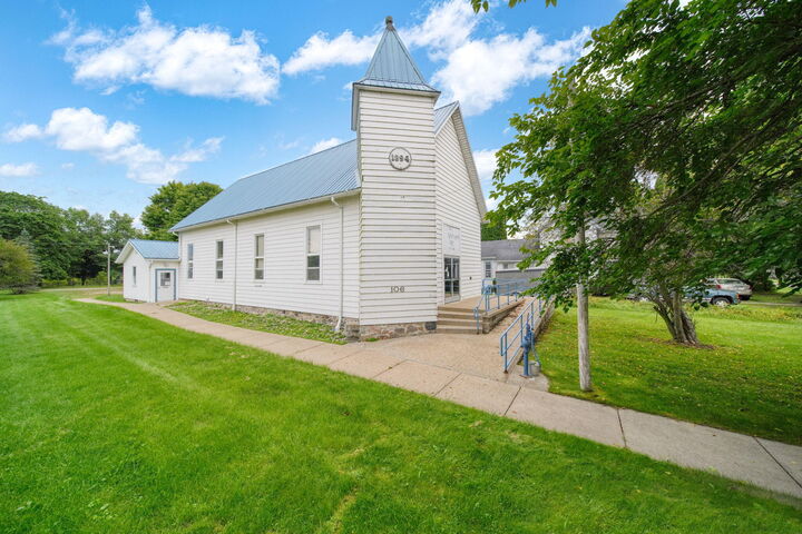 Property Photo:  106 E Commercial Street  MI 49230 