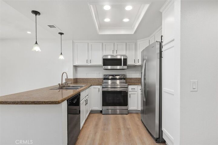 Property Photo:  142 Stanford Court 71  CA 92612 