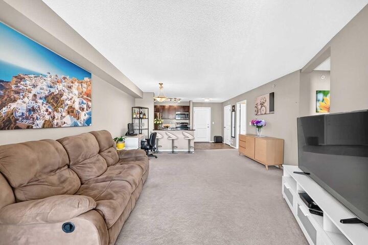 Property Photo:  15 Saddlestone Way NE 416  AB T3J 0S3 