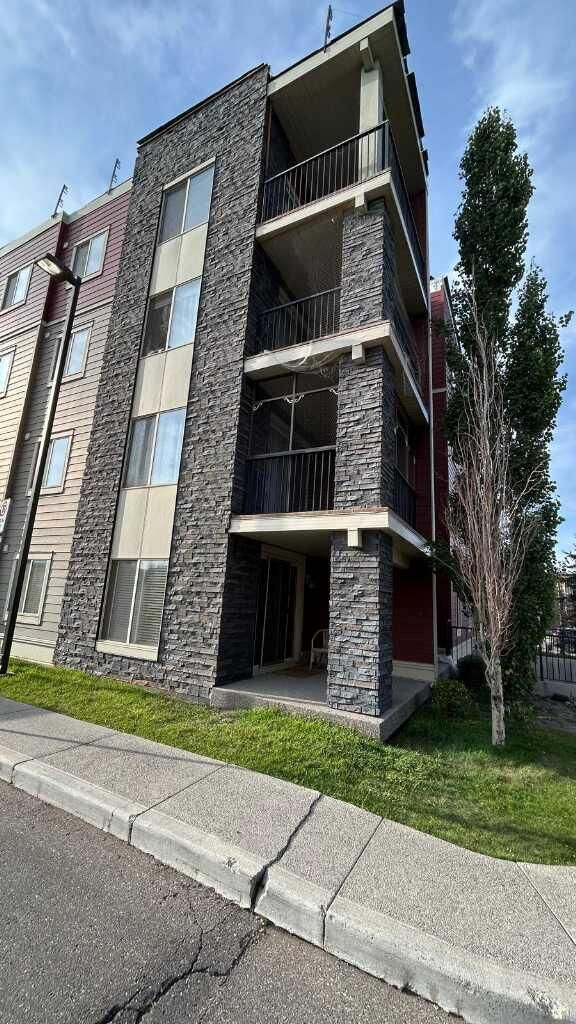 Property Photo:  5 Saddlestone Way NE 218  AB T3J 0S2 