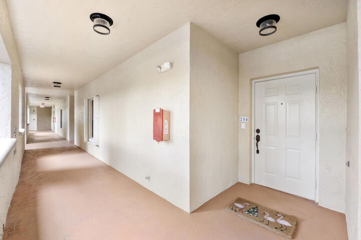 Property Photo:  800 Uno Lago Drive 204  FL 33408 
