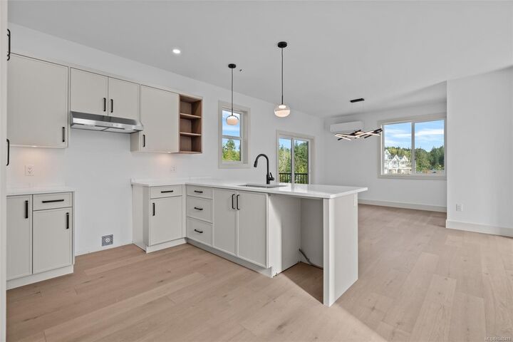 Property Photo:  571 Bezanton Way #1  BC V9C 0H2 