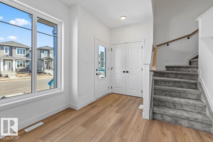 Property Photo:  61 Juniper Wynd  AB T8L 3S4 