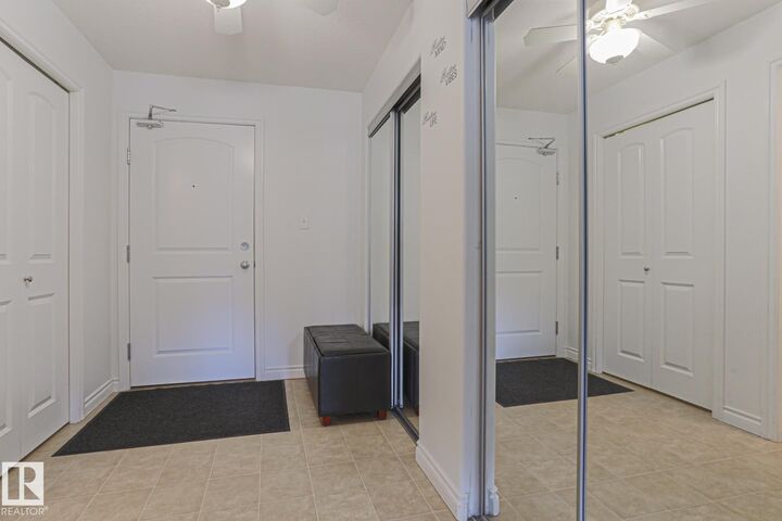 Property Photo:  50 Woodsmere 237  AB T8L 4N9 