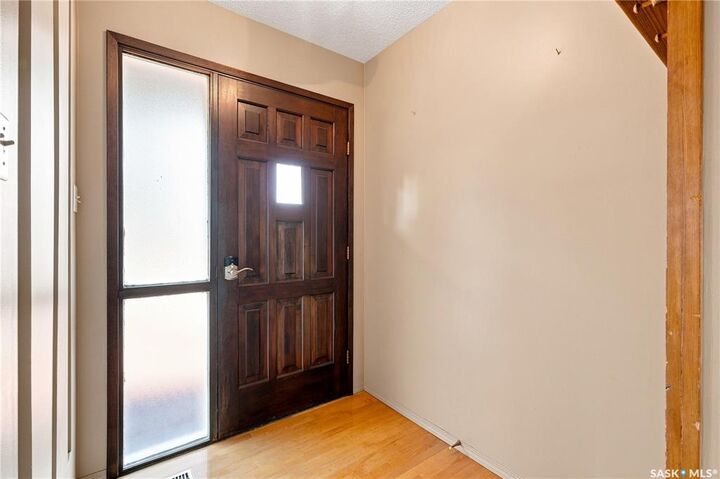 Property Photo:  402 Begg Crescent  SK S7H 4P5 