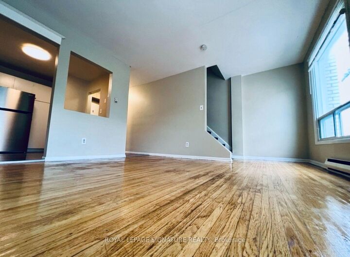 Property Photo:  2203 Danforth Avenue A  ON M4C 1K4 