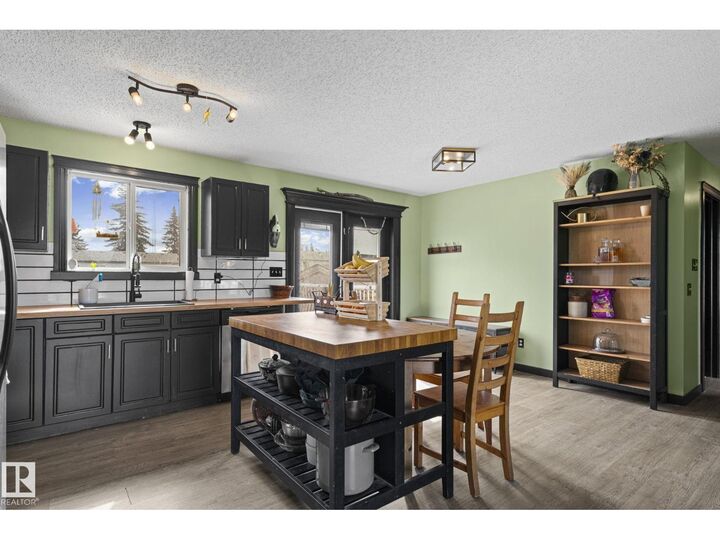 Property Photo:  34 Spruce Meadow Ln  AB T0A 0K0 