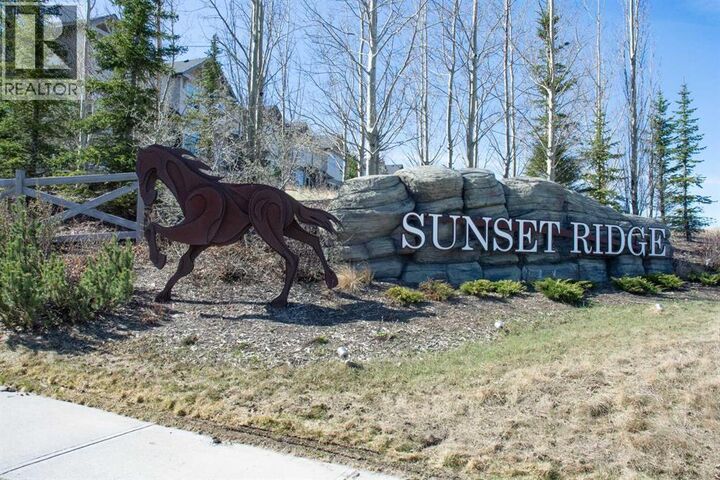 Property Photo: 197 Sundown Road AB T4C 2M6