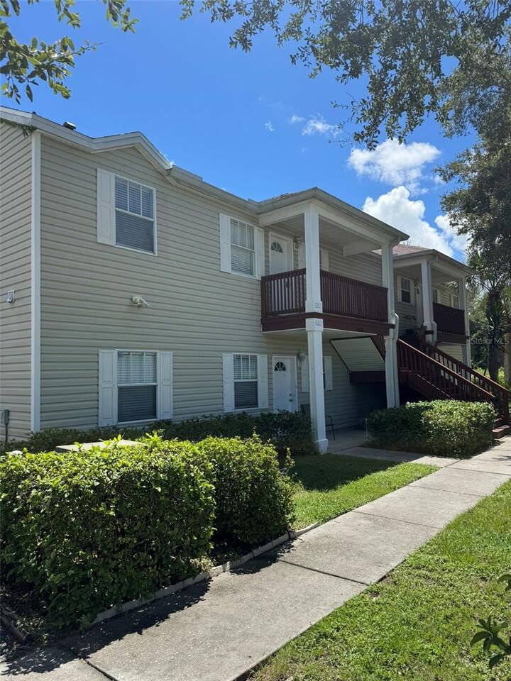 Property Photo: 9004 Shallowford Lane #201 FL 34668
