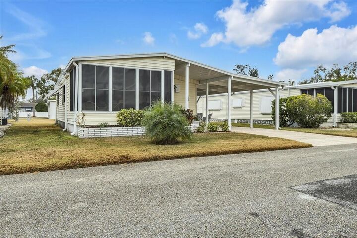 Property Photo:  808 53rd Avenue E 209  FL 34203 