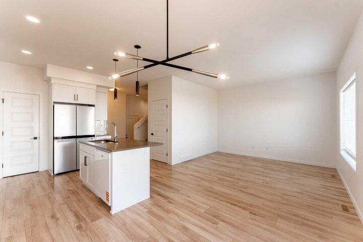 Property Photo:  91 Blackwolf Pass N  AB T1H 7H8 