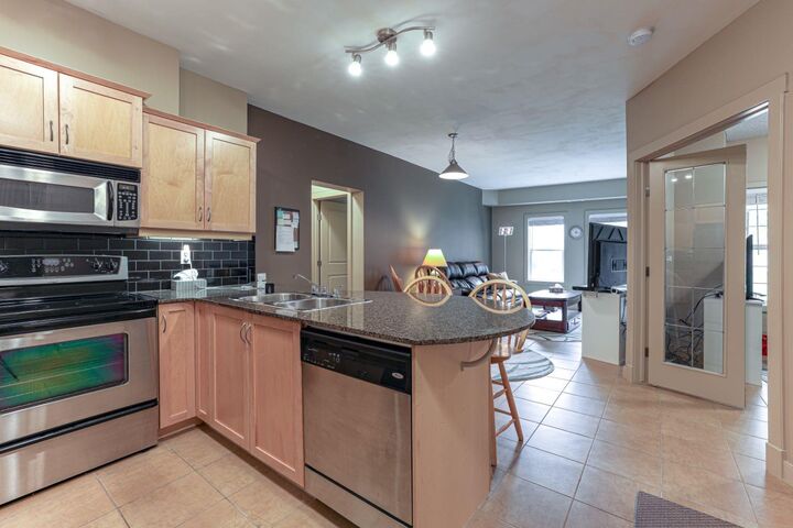 Photo de la propriété: 11811 Lake Fraser Drive SE 1305 AB T2J 7J1