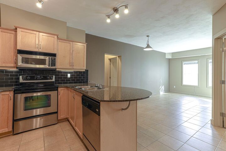 Photo de la propriété: 11811 Lake Fraser Drive SE 1305 AB T2J 7J1