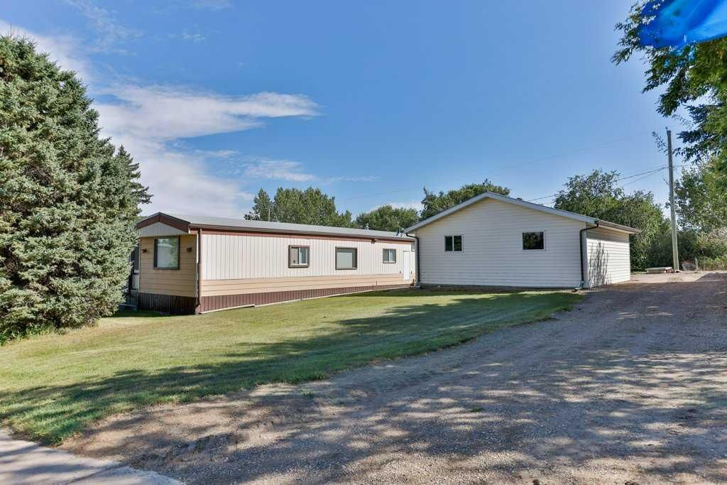Property Photo:  204 1 Street N  AB T0L 1G0 