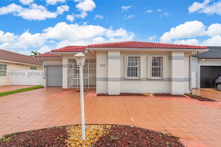 Property Photo:  9053 NW 146th Ter  FL 33018 