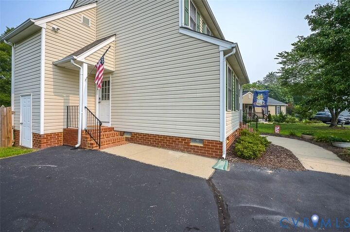 Property Photo: 7869 Silktree Place VA 23111