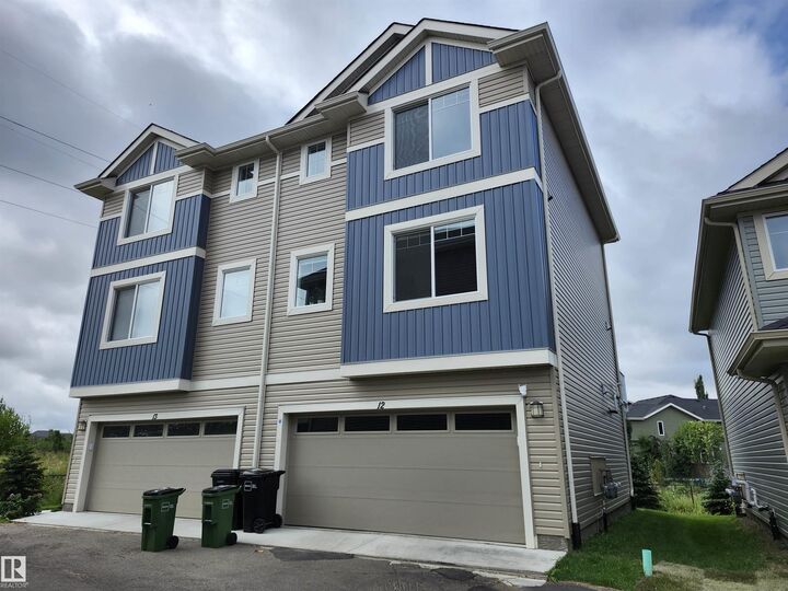 Property Photo:  13139 205 Street NW 12  AB T5S 0N1 