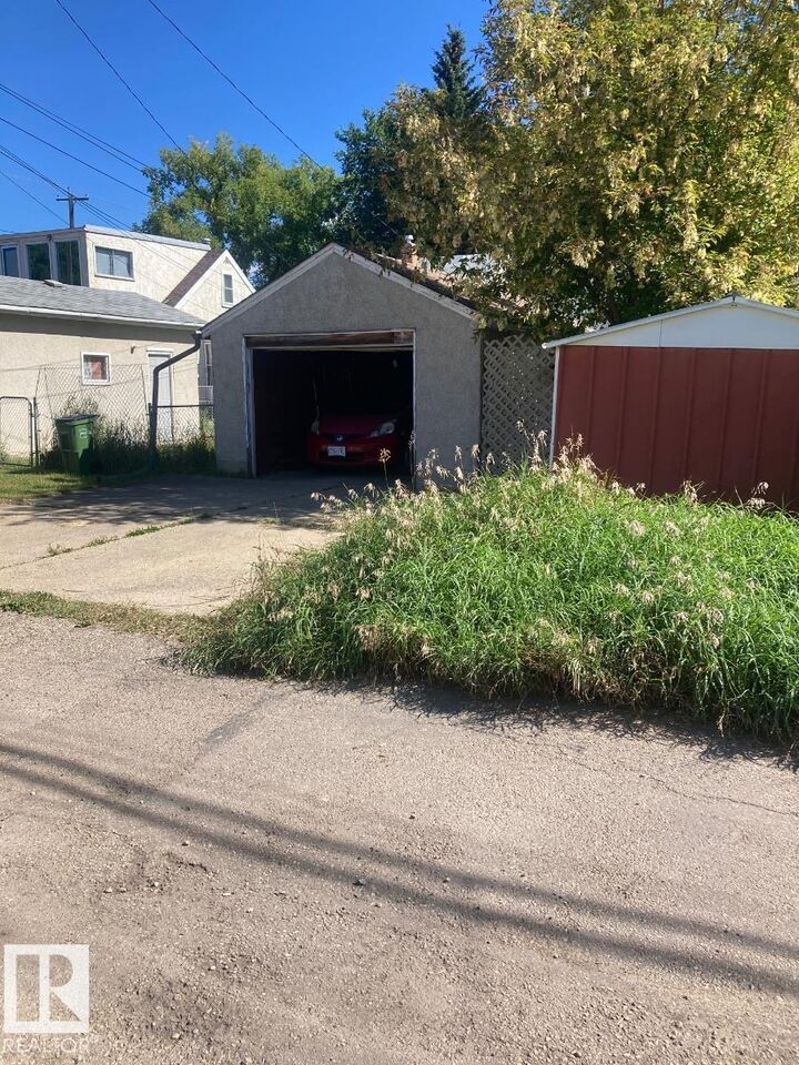 Property Photo: 11438 83 Street NW AB T5B 2Y3