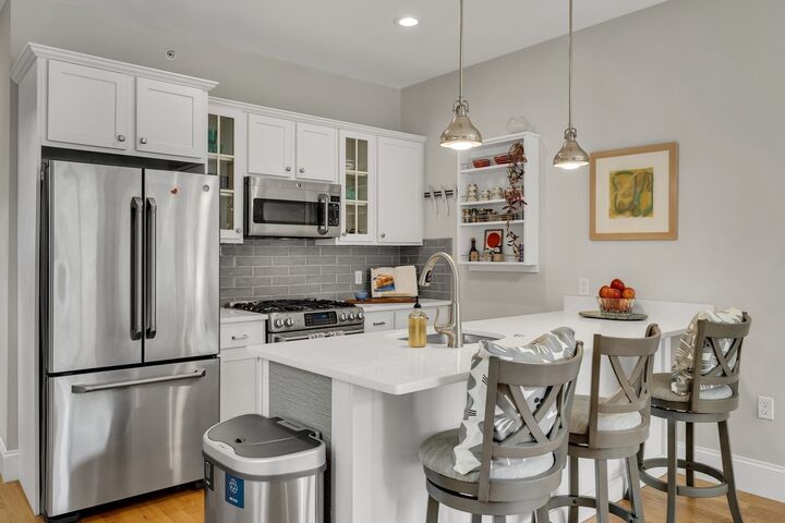 Property Photo:  235 Lowell St 1  MA 02143 