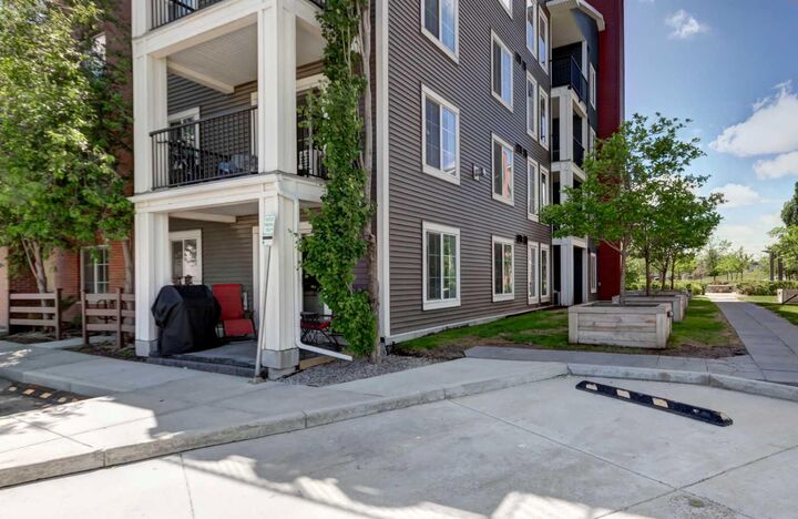 Property Photo:  755 Copperpond Boulevard SE 2114  AB T2Z 4R2 