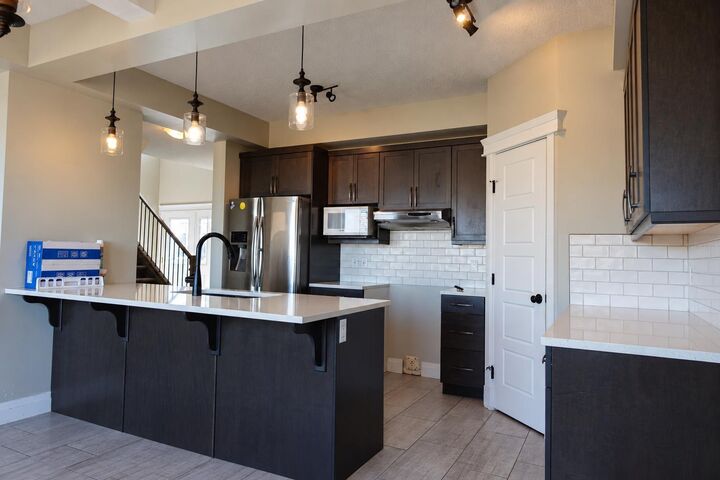 Property Photo:  8674 122 Avenue  AB T8X 0P6 