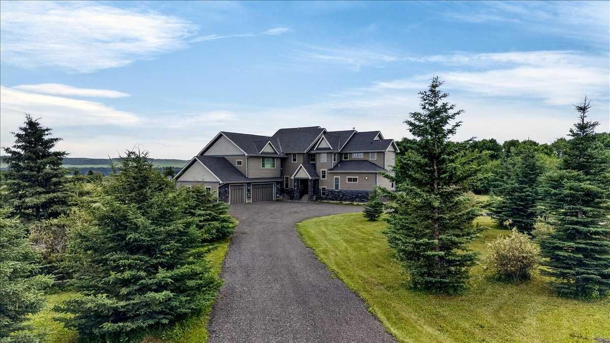 Property Photo:  240117 210 Avenue W 100  AB T0L 1W4 
