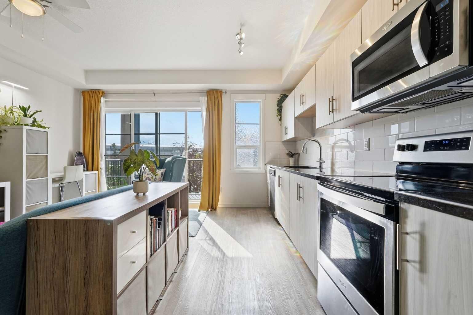 Property Photo:  151 Legacy Main Street SE 7206  AB T2X 4A4 