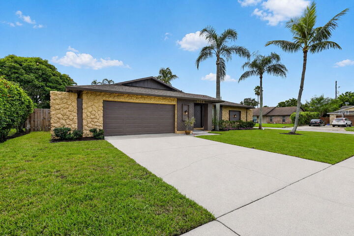 Property Photo:  1058 Fernlea Drive  FL 33417 