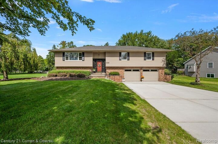 Property Photo:  219 E Caledonia Street  MI 48843 