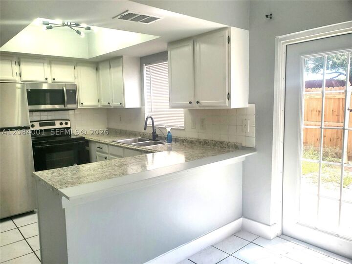 Property Photo:  7926 Kimberly Blvd 202  FL 33068 
