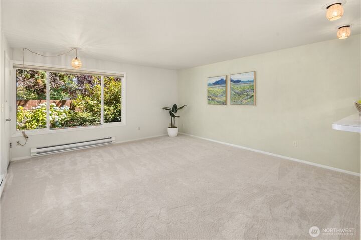 Property Photo:  6055  35th Avenue SW 107  WA 98126 
