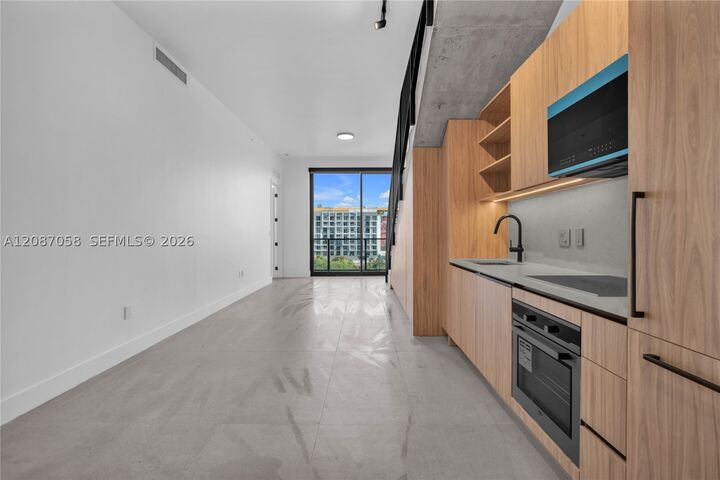 Property Photo:  91 NW 27th St 502  FL 33127 